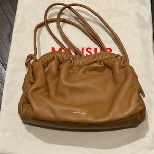 MINI CLOUD CLUTCH, CAMEL. Mansur Gavriel handcrafted in Italian lambskin.